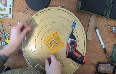 Jon Beaton building his praxinoscope out of a Kodak film can.